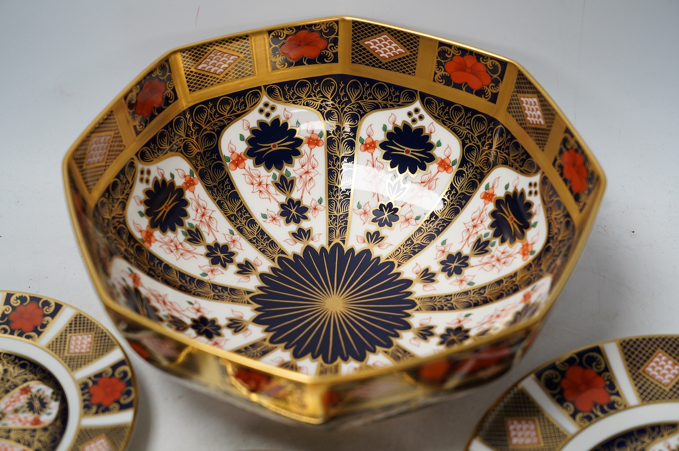 A Royal Crown Derby Imari pattern bowl and six plates, largest 25cm diameter. Condition - good, all factory seconds apart from large dish